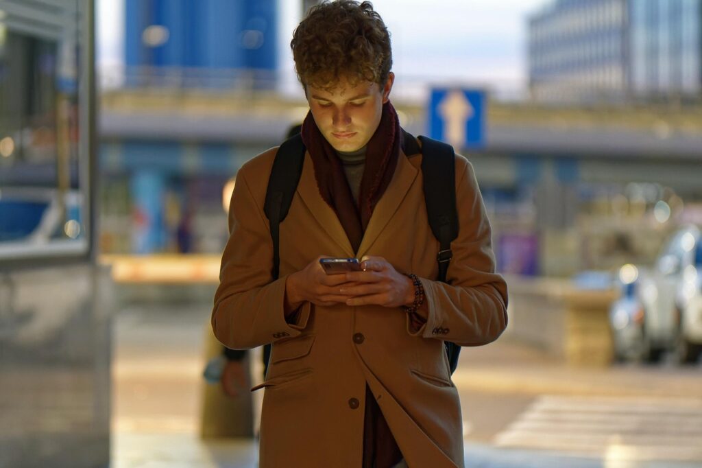     Person using a smartphone to search for nearby restaurants on a map

