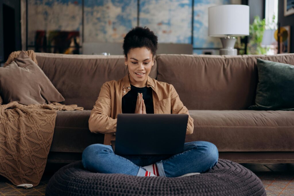 Person using a laptop at home to explore AI tools and technology
